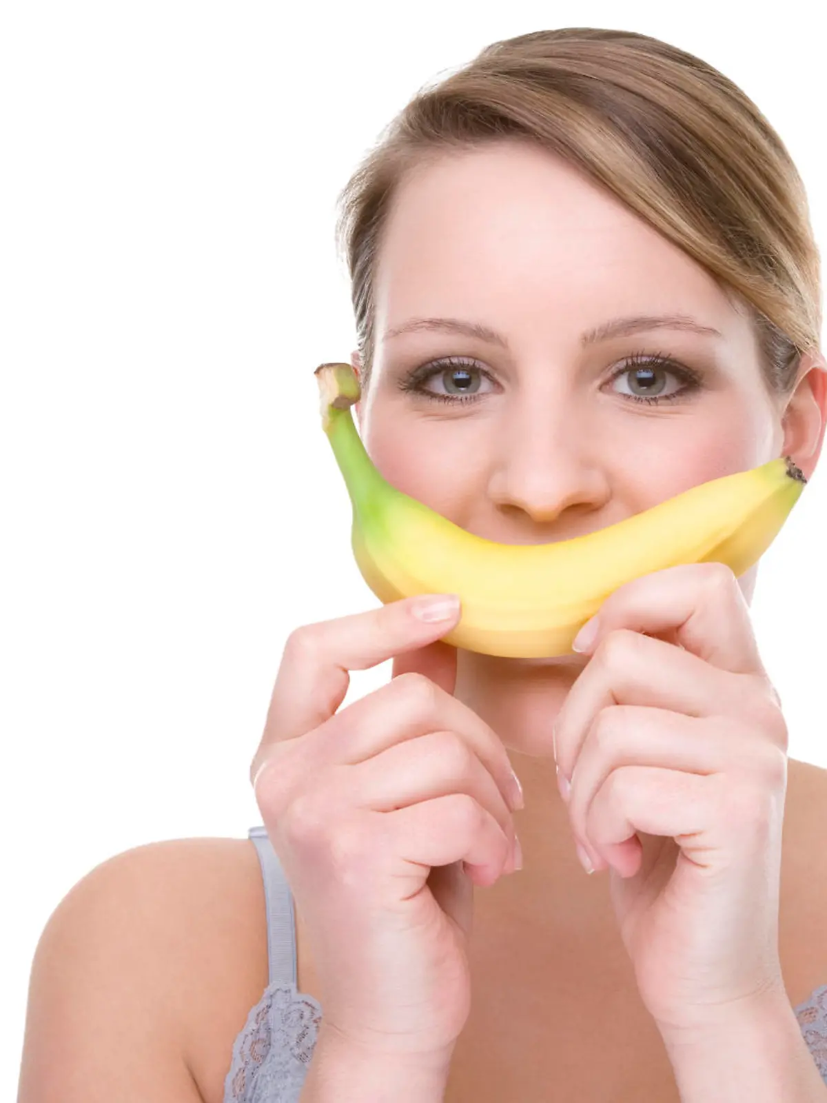 Full isolated portrait of a beautiful caucasian woman with some bananas