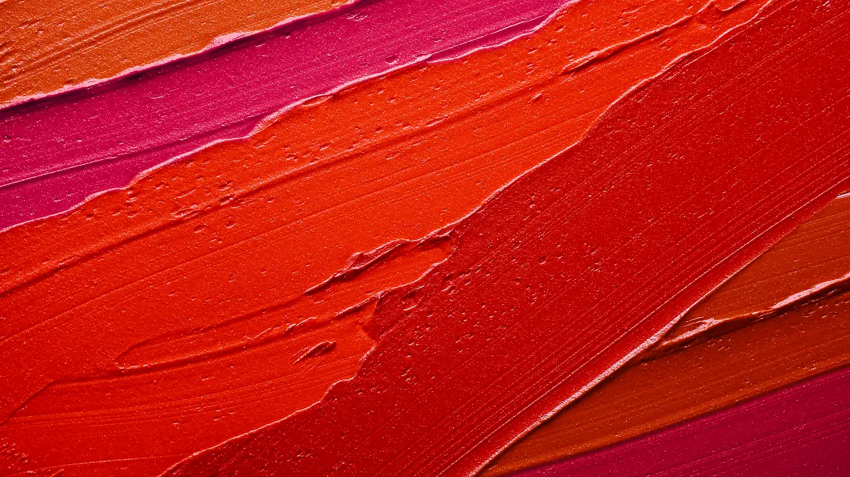 Rot lässt die Zähne weißer erstrahlen