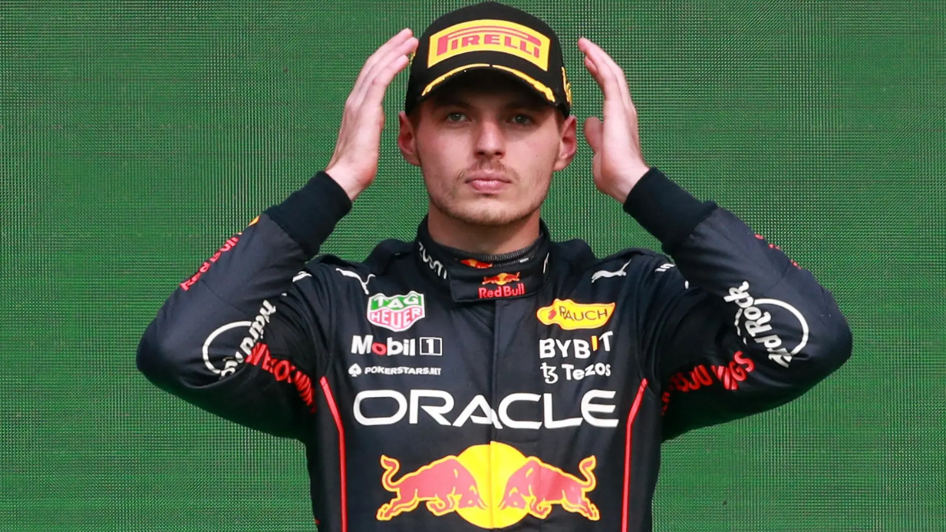 Formula One F1 - Mexico City Grand Prix - Autodromo Hermanos Rodriguez, Mexico City, Mexico - October 30, 2022 Red Bull's Max Verstappen celebrates on the podium after winning the race and setting a new F1 record of 14 grand prix wins in a season REUTERS/Henry Romero