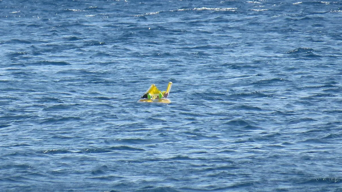 CANAKKALE, TURKEY - JULY 3: 10 month-old baby Melda Ilgin is seen as she drifts a kilometer out to sea on a sea buoy in Ayvacik district of Canakkale province, Turkey on July 3, 2015. (Photo by Hanife Erdinc/Anadolu Agency/Getty Images)