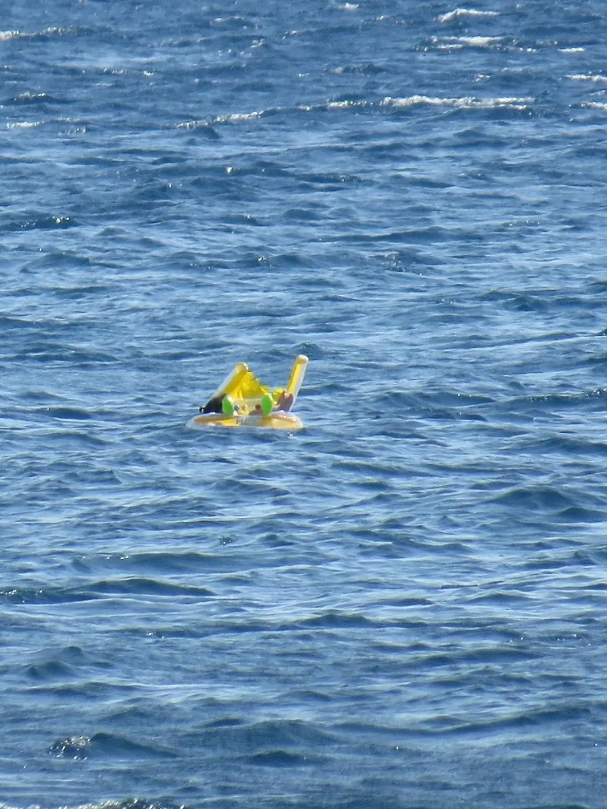 CANAKKALE, TURKEY - JULY 3: 10 month-old baby Melda Ilgin is seen as she drifts a kilometer out to sea on a sea buoy in Ayvacik district of Canakkale province, Turkey on July 3, 2015. (Photo by Hanife Erdinc/Anadolu Agency/Getty Images)