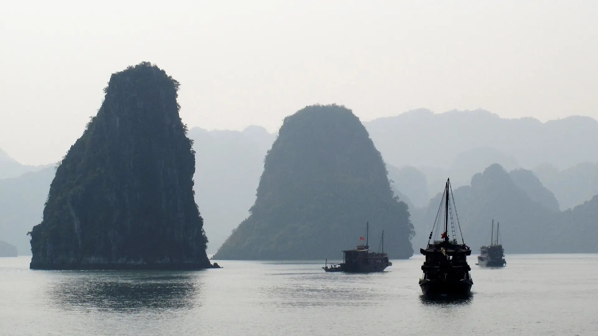 FILE PHOTO: File photo of tourist boats cruising in Halong Bay