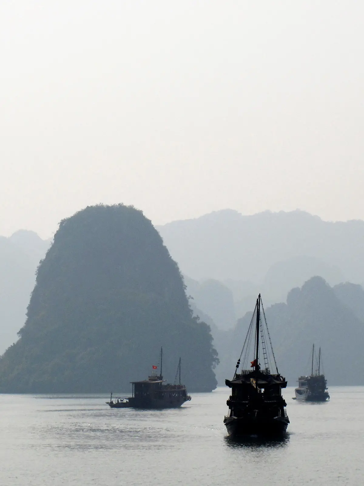 FILE PHOTO: File photo of tourist boats cruising in Halong Bay