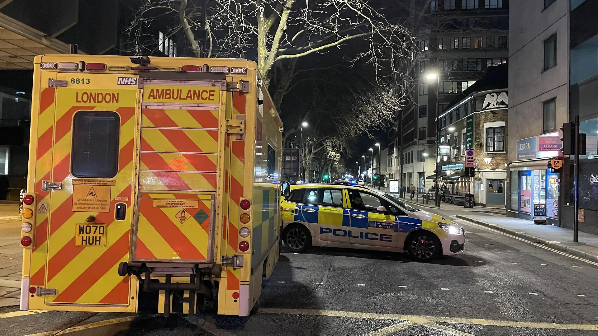 LONDON, UK - JANUARY 14: Police take measures after five people, including two children between the ages of 7 and 12, were injured Saturday after shots were fired from a moving vehicle in central London, United Kingdom on January 14, 2023. Roads near the scene are still closed to traffic as of 9 p.m. There is also increased police presence with an ambulance in the area. Burak Bir / Anadolu Agency