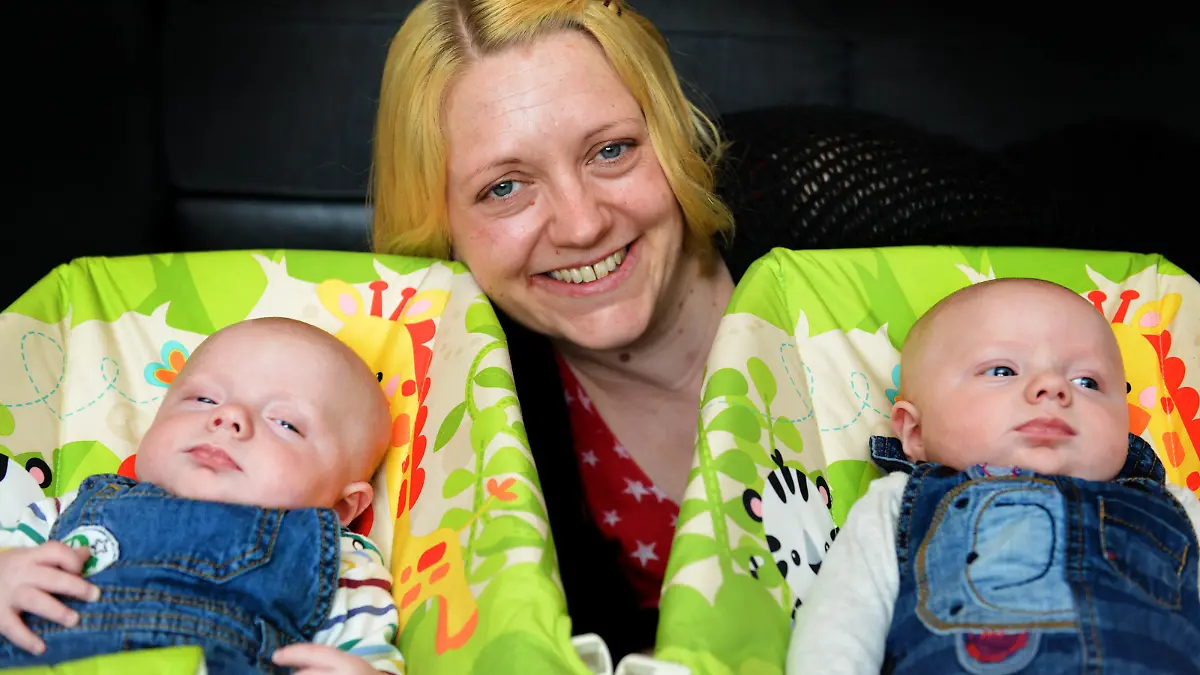 PIC FROM CATERS NEWS - (PICTURED Kirsty Dean with her 13 week old twins , left , Harry and Hunter who suffered twin transfusion syndrome.) These tenacious identical twins are defying the odds after fears their mother would lose one, if not both of her babies. Kirsty Dean, 36, found out twenty weeks into her pregnancy that her babies were suffering from twin-to-twin transfusion syndrome (TTIS), meaning one baby was getting more blood than the other. Kirsty and her partner Anthony Willoughby were faced with the agonising prospect of losing one if not both of their babies. SEE CATERS COPY