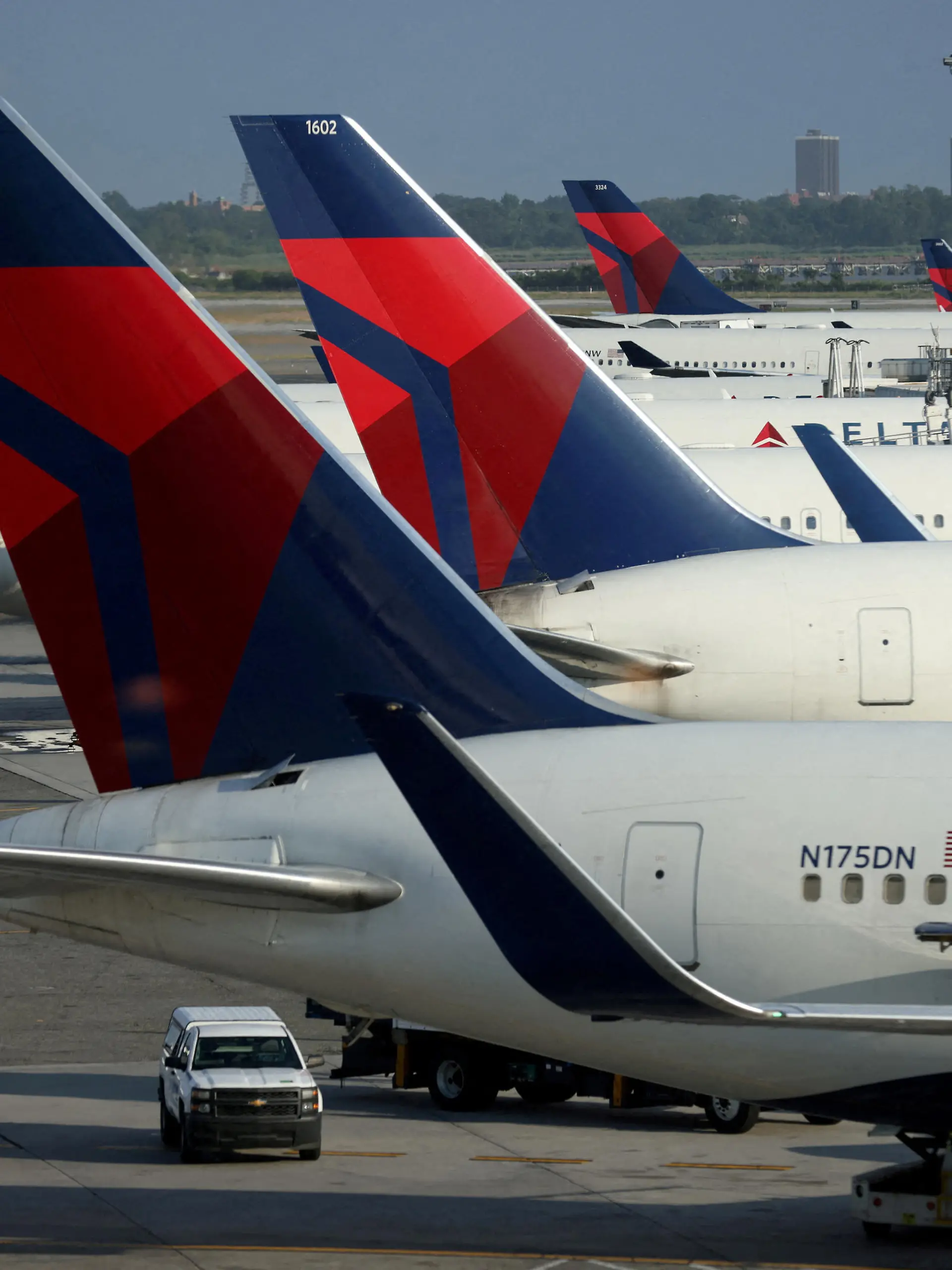 FILE PHOTO: Delta Air Lines planes are seen at John F. Kennedy International Airport on the July 4th weekend in Queens, New York City, U.S., July 2, 2022. REUTERS/Andrew Kelly/File Photo