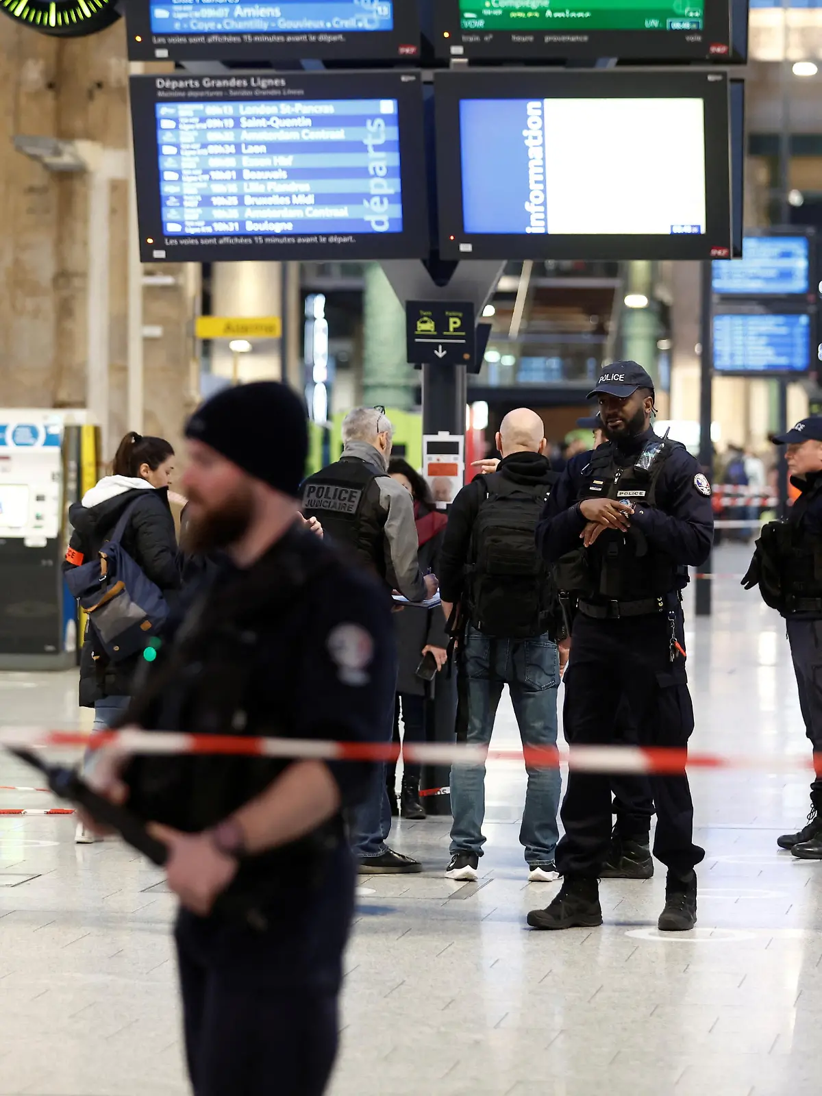 French police secure the area after a man with a knife wounded several people at the Gare du Nord train station in Paris, France, January 11, 2023. REUTERS/Benoit Tessier