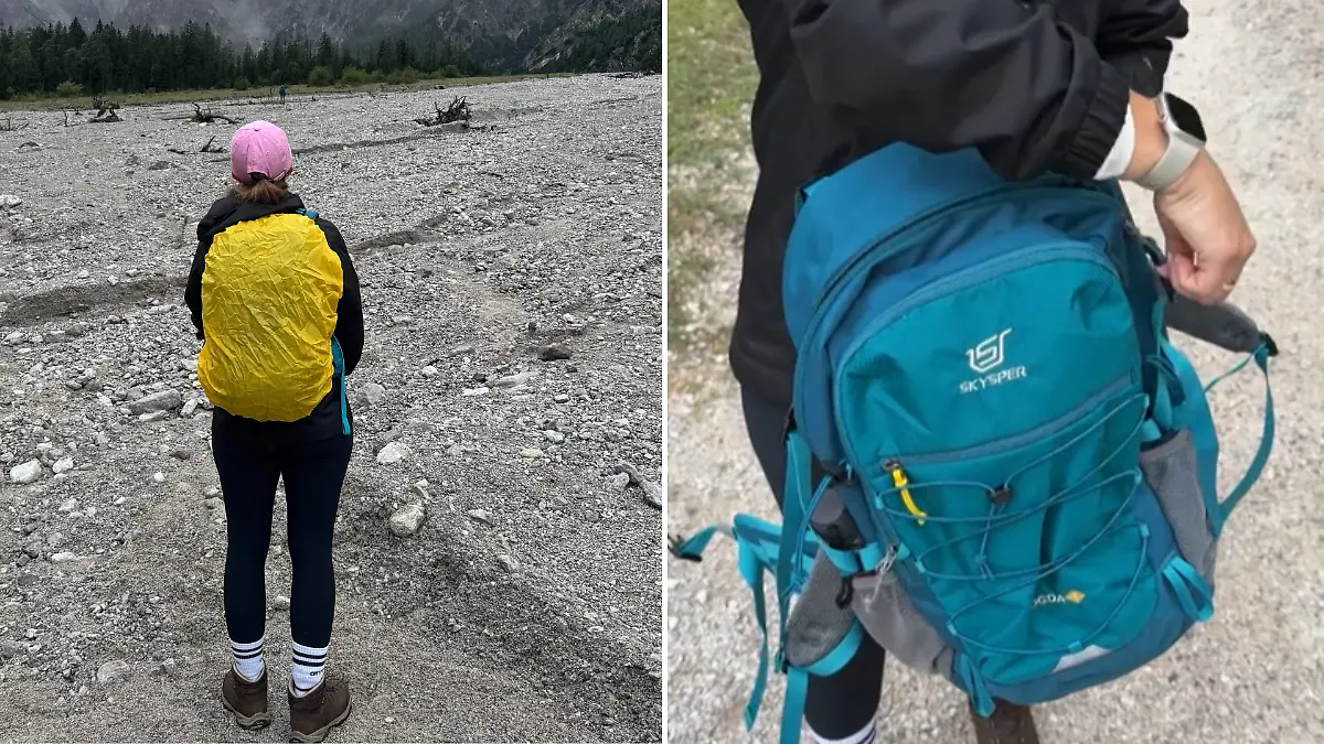 Reporterin mit türkisen Wanderrucksack in den Bergen.