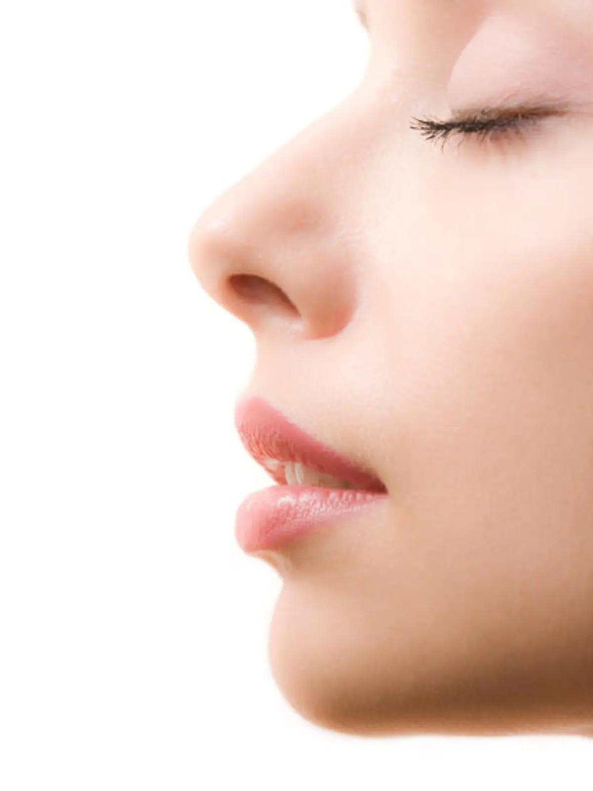Profile of feminine face with closed eyes and make-up