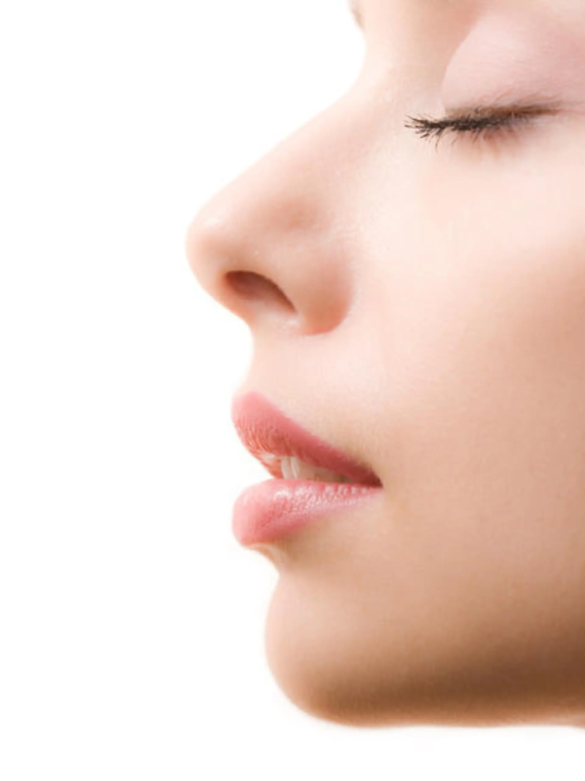 Profile of feminine face with closed eyes and make-up