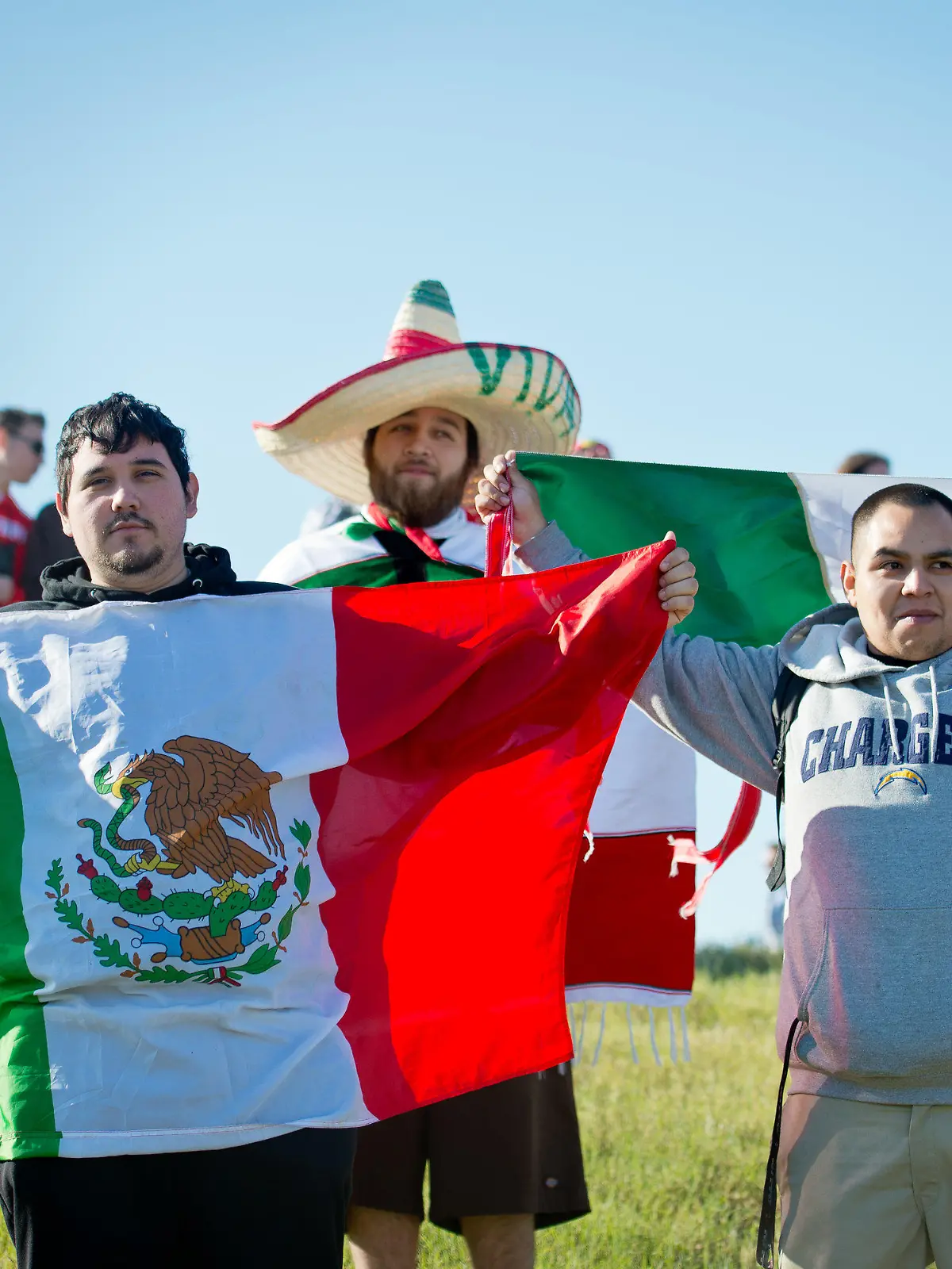 Three Mexican supporters watch the first practice session at the Circuit of The Americas in Austin, Texas, USA, 16 November 2012. The Formula One United States Grand Prix will take place on 18 November 2012. Photo: David Ebener dpa  +++(c) dpa - Bildfunk+++