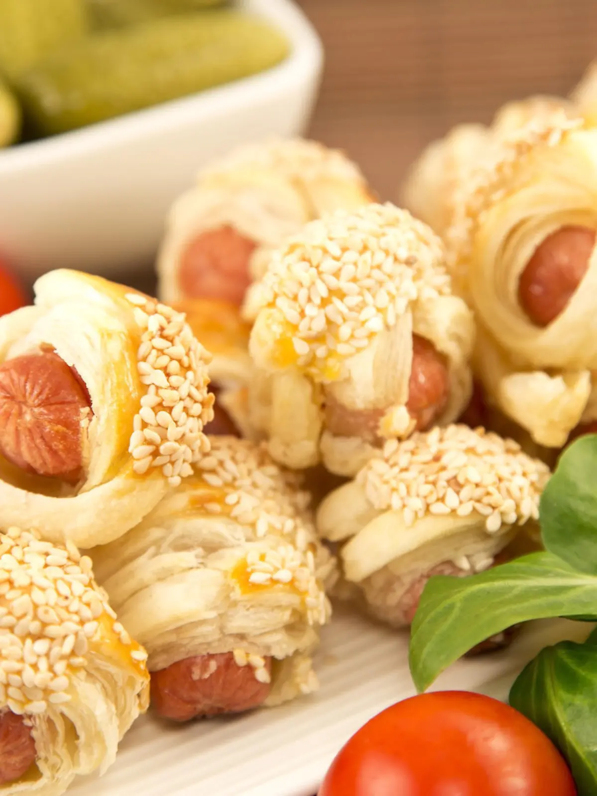 Pastry snack with the mini hot dogs close up