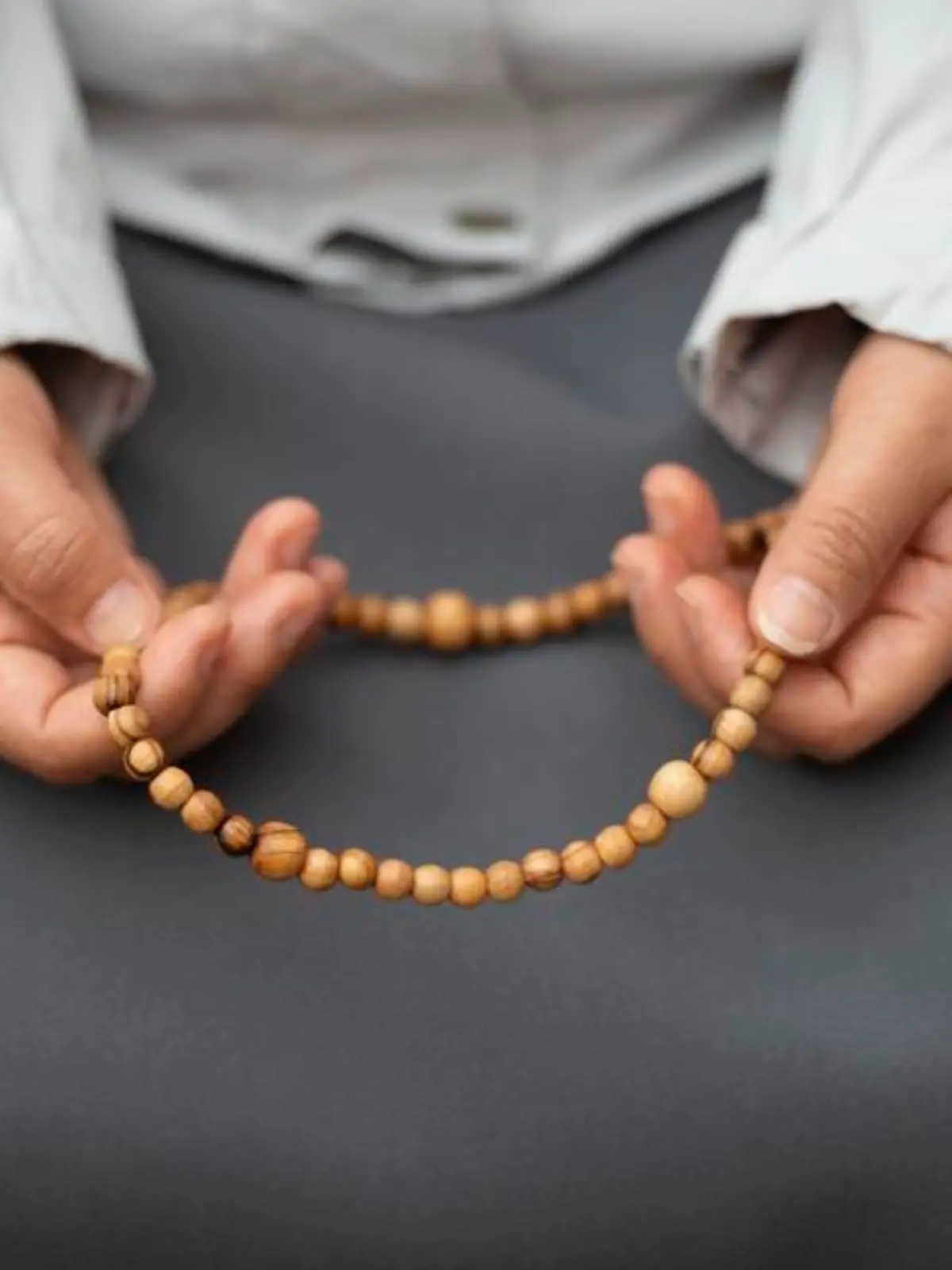 A nun praying the holy rosary, Vatican city.