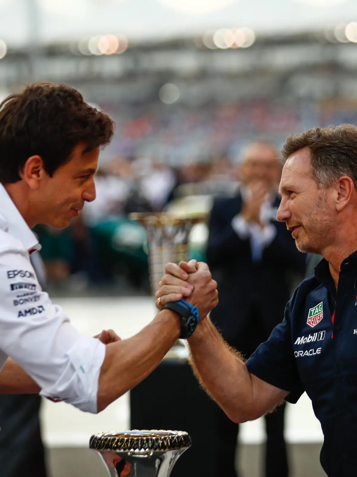  Formula 1 2021: Abu Dhabi GP YAS MARINA CIRCUIT, UNITED ARAB EMIRATES - DECEMBER 12: Toto Wolff, Team Principal and CEO, Mercedes AMG, and Christian Horner, Team Principal, Red Bull Racing, arm wrestle over the trophy on the grid during the Abu Dhabi GP at Yas Marina Circuit on Sunday December 12, 2021 in Abu Dhabi, United Arab Emirates. Photo by Sam Bloxham / LAT Images Images PUBLICATIONxINxGERxSUIxAUTxHUNxONLY GP2122_134506_J6I1754
