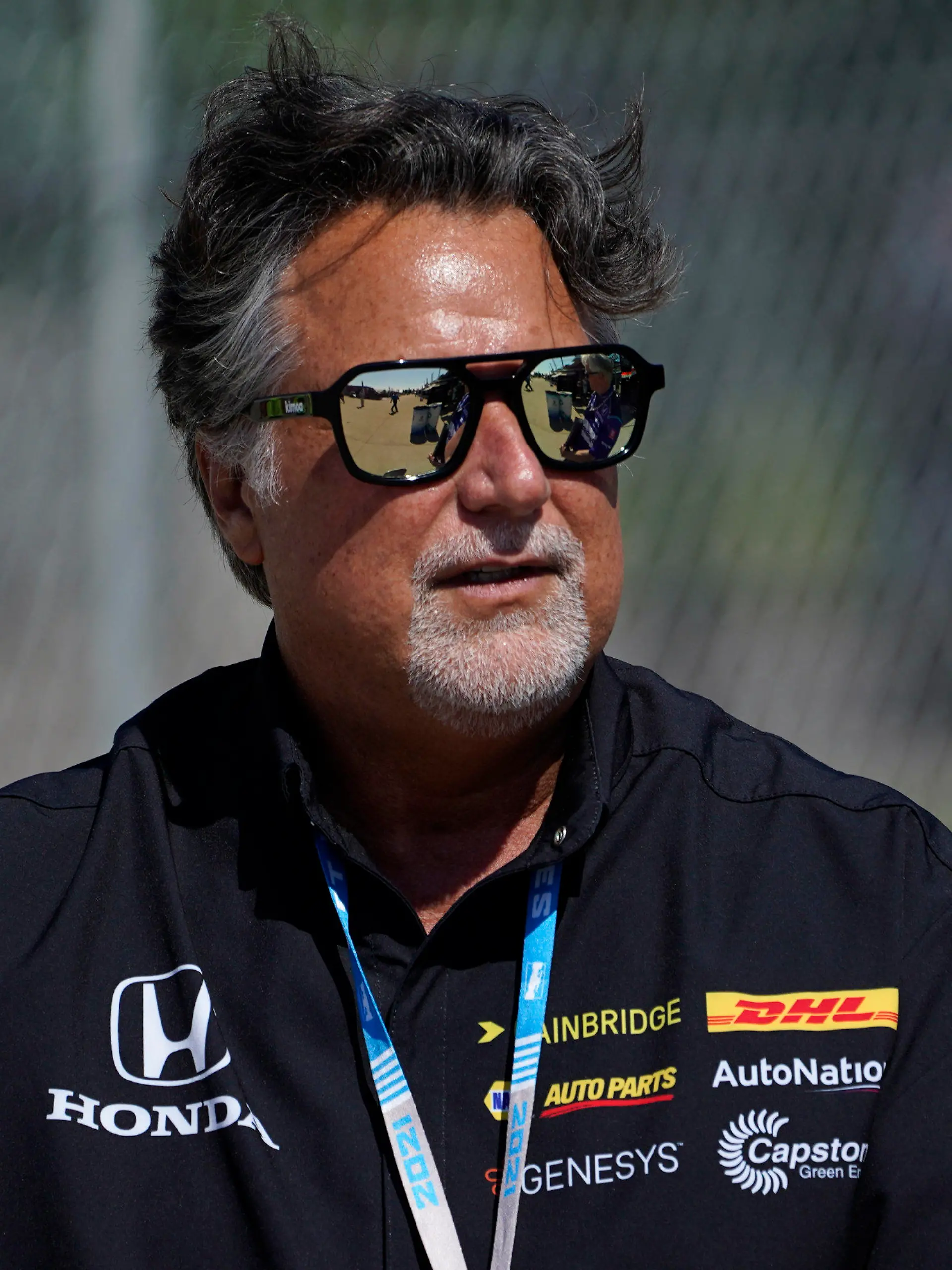 FILE - Team owner Michael Andretti looks on during practice for the IndyCar Detroit Grand Prix auto racing doubleheader on Belle Isle in Detroit, on June 11, 2021. If things had gone according to plan, Colton Herta would be in Miami preparing for the fifth Formula One race of his career.  Instead, the 22-year-old Californian is headed to the inaugural Miami Grand Prix as a spectator. His boss, Michael Andretti, meanwhile, awaits any word whatsoever on his bid to start a Formula One team and bring a true American team to the grid.  (AP Photo/Paul Sancya, File)