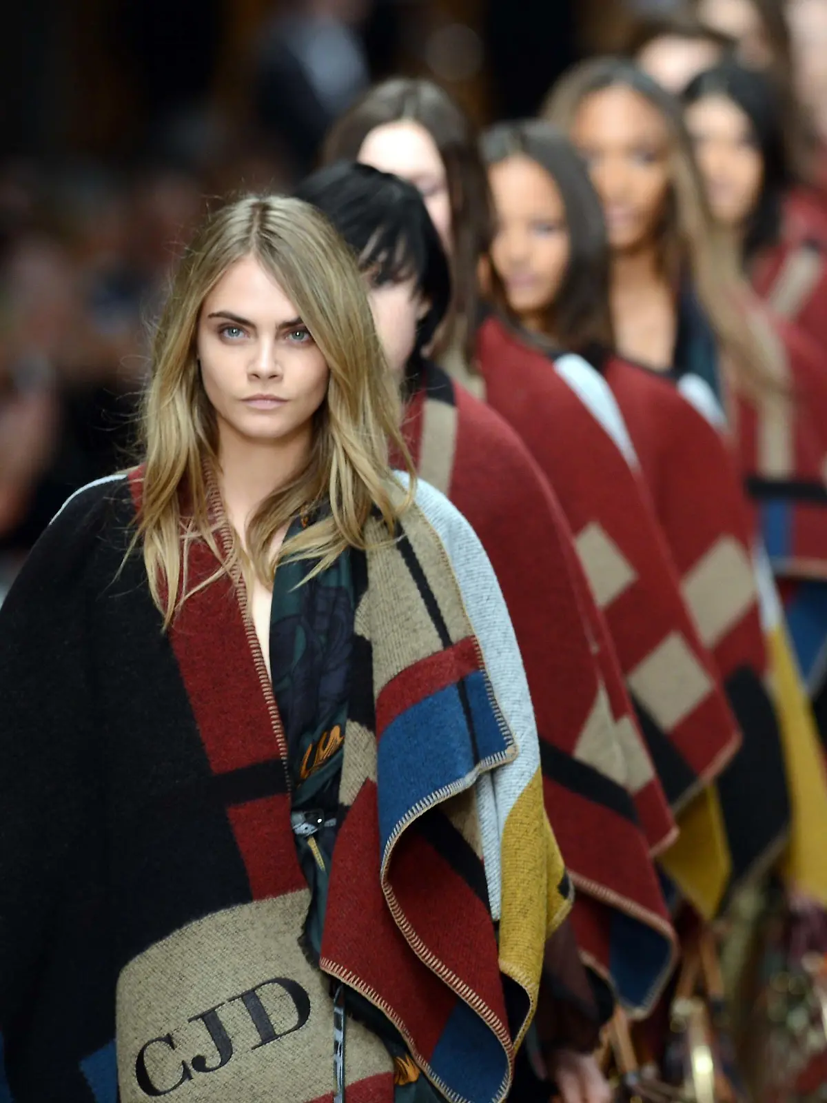 Feb. 17, 2014 - London, England, United Kingdom - Cara Delevingne closes the Burberry Prorsum show at London Fashion Week A/W 14, Monday, 17th February 2014. Picture by Stephen Lock / i-Images