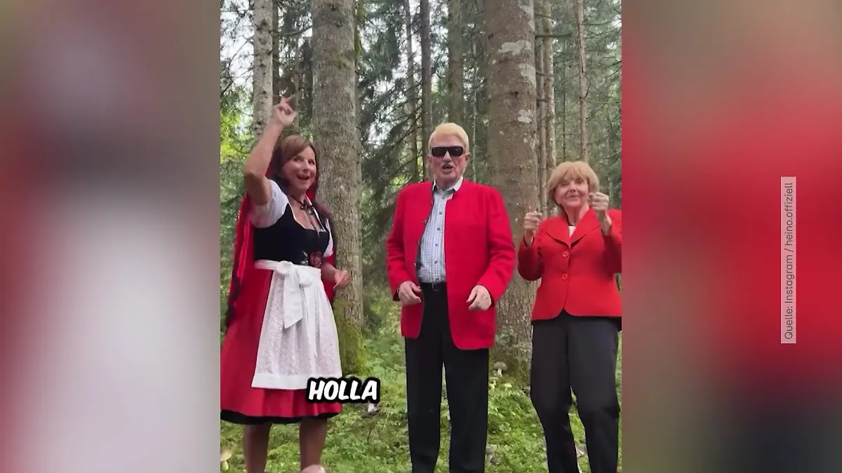 Claudia Obert, Heino und ein Angela-Merkel-Double sind im neuen Musikvideo des Schlagersängers zu sehen. 