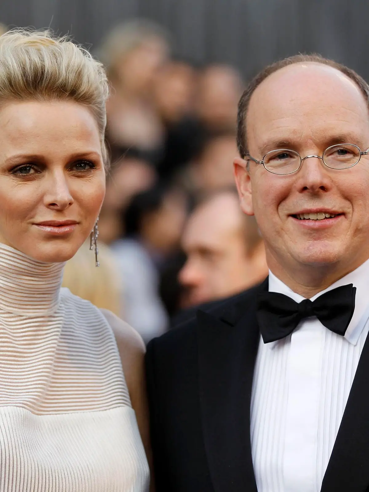 Prince Albert of Monaco and his wife Princess Charlene arrive at the 84th Academy Awards in Hollywood, California, February 26, 2012.   REUTERS/Lucy Nicholson (UNITED STATES  - Tags: ENTERTAINMENT ROYALS)  (OSCARS-ARRIVALS)