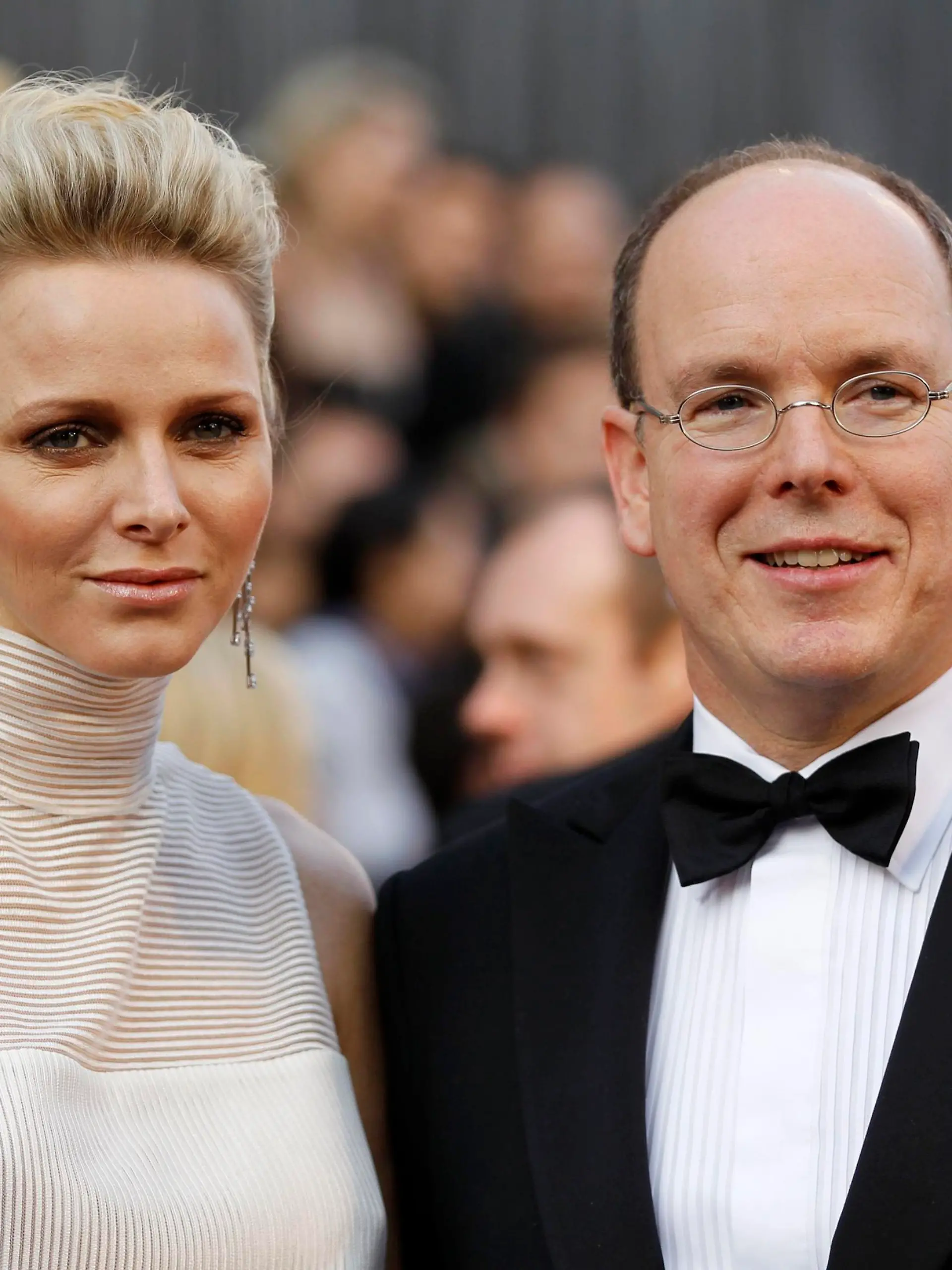 Prince Albert of Monaco and his wife Princess Charlene arrive at the 84th Academy Awards in Hollywood, California, February 26, 2012.   REUTERS/Lucy Nicholson (UNITED STATES  - Tags: ENTERTAINMENT ROYALS)  (OSCARS-ARRIVALS)