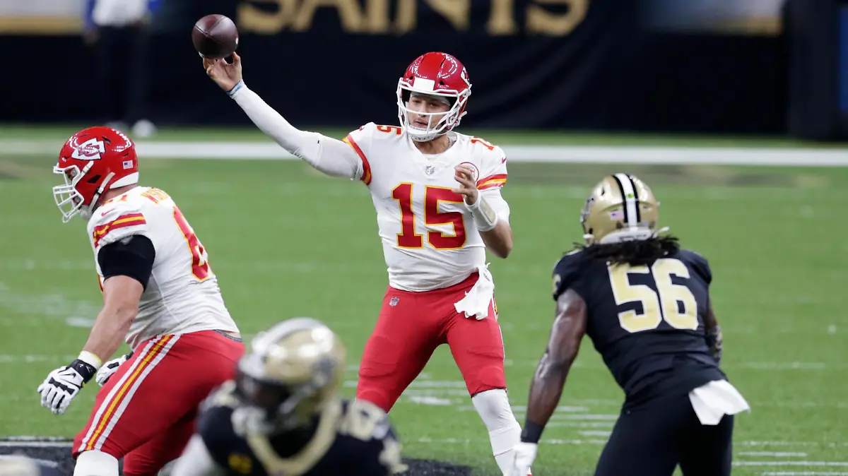 Kansas City Chiefs quarterback Patrick Mahomes (15) passes in the first half of an NFL football game against the New Orleans Saints in New Orleans, Sunday, Dec. 20, 2020. (AP Photo/Butch Dill)