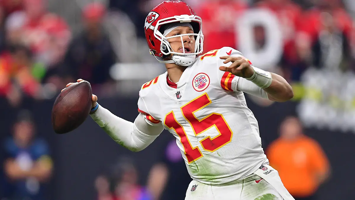 Jan 7, 2023; Paradise, Nevada, USA; Kansas City Chiefs quarterback Patrick Mahomes (15) throws against the Las Vegas Raiders during the second half at Allegiant Stadium. Mandatory Credit: Gary A. Vasquez-USA TODAY Sports