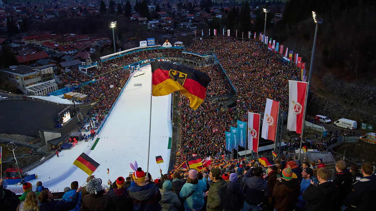 Fans with german national flags and David Kubacki, POL on the screen at the 71. Four Hills Tournament Ski jumping, Skispringen, Ski, nordisch at WM-Skisprung Arena Oberstdorf , Bavaria, Germany, Dec 29, 2022.
