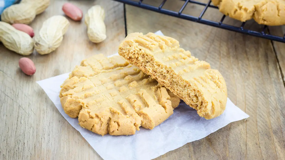 Freshly baked homemade peanut butter cookies on a cooling rack