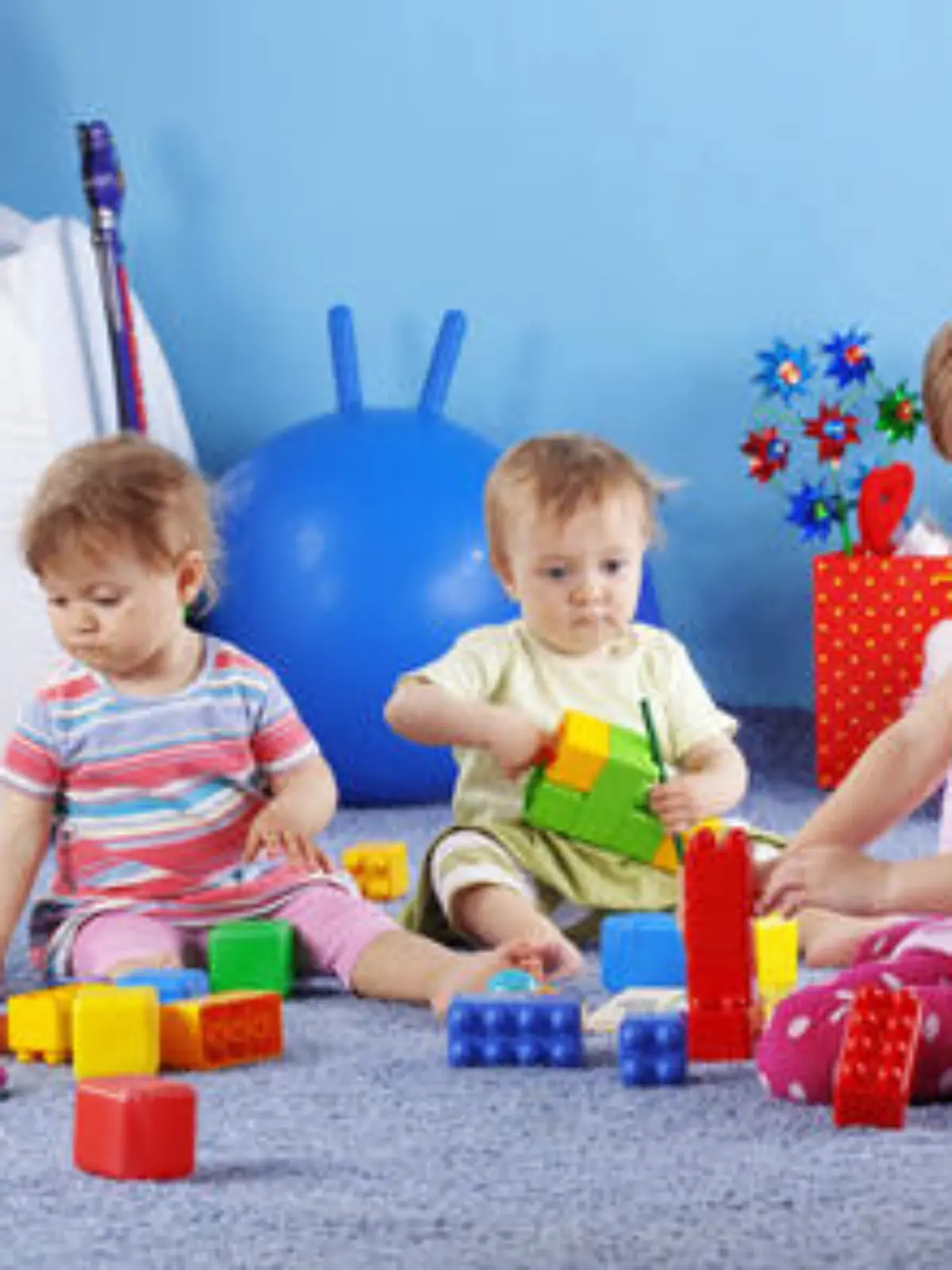Group of kids playing with constructor