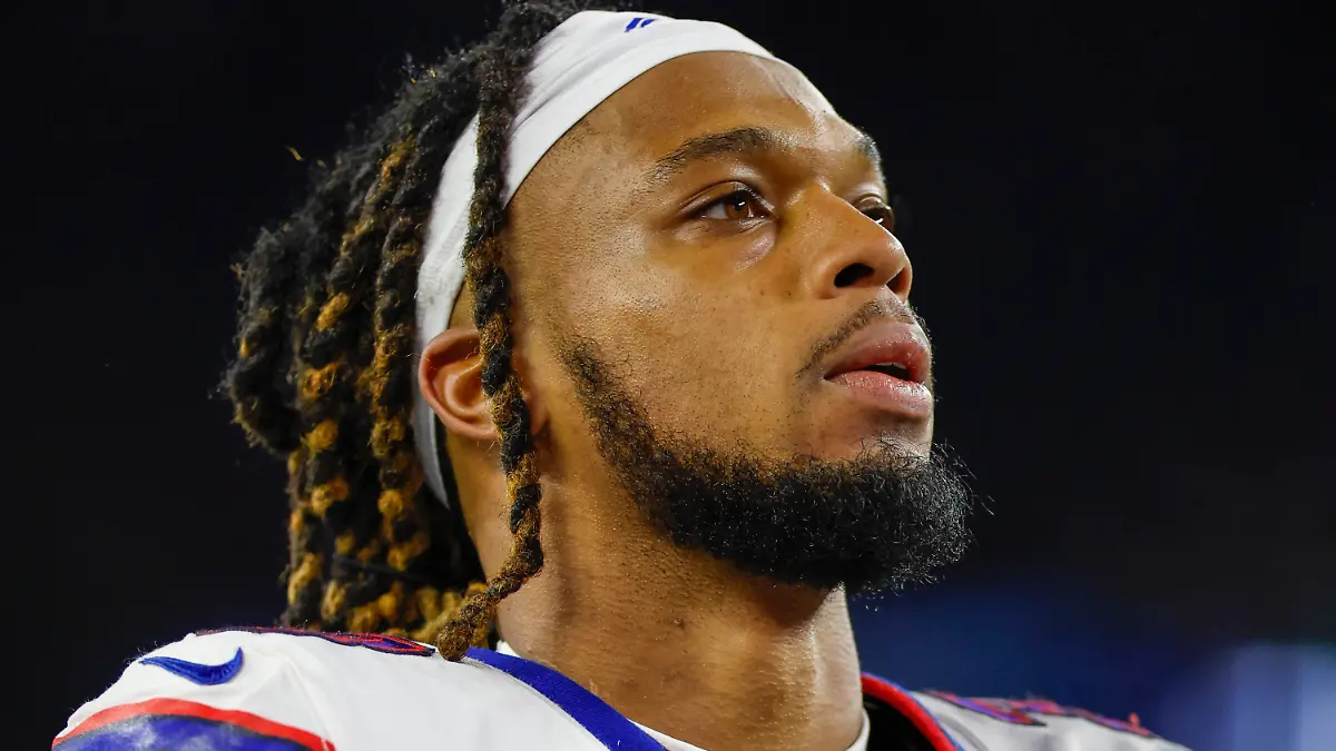 FILE - Buffalo Bills defensive back Damar Hamlin (3) leaves the field after an NFL football game against the New England Patriots, Thursday, Dec. 1, 2022, in Foxborough, Mass. Quick on-the-field emergency care from well-rehearsed medical personnel is widely credited with helping save Damar Hamlin’s life. But whether his cardiac arrest could have been prevented is much less certain. (AP Photo/Greg M. Cooper, File)