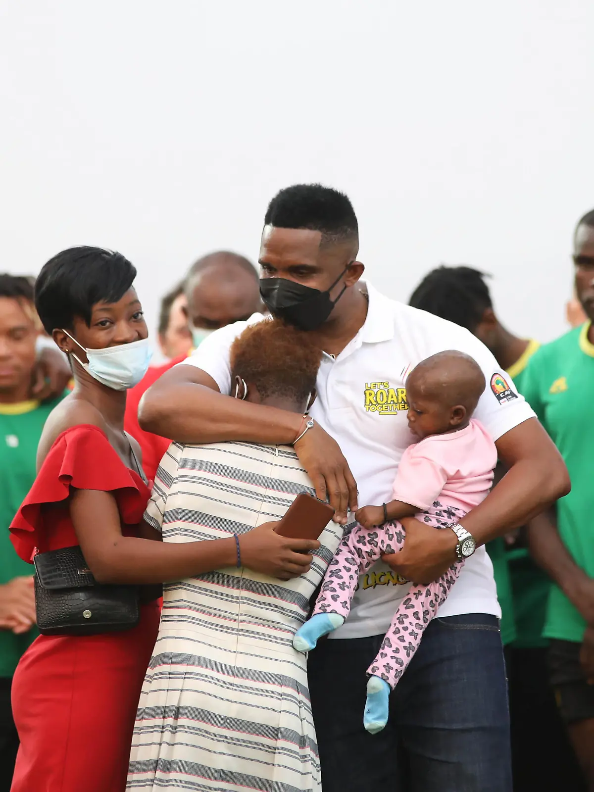 Football - 2021 Africa Cup of Nations - Finals - Semifinal - Cameroon Training - Yaounde - Cameroon. Samuel Etoo with families of victims of the stampede during the 2021 Africa Cup of Nations Afcon Finals semifinal Cameroon Training in Yaounde, Cameroon on 02 February 2022 ©Sports Inc URN:65059791