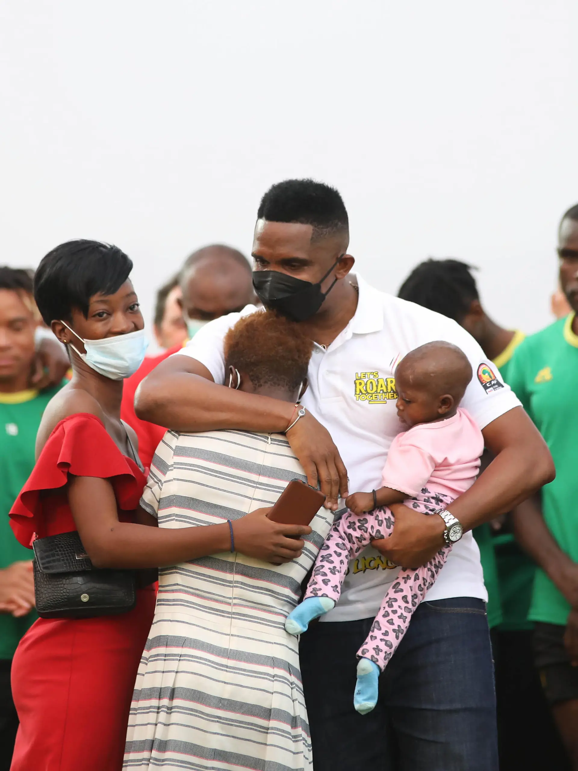 Football - 2021 Africa Cup of Nations - Finals - Semifinal - Cameroon Training - Yaounde - Cameroon. Samuel Etoo with families of victims of the stampede during the 2021 Africa Cup of Nations Afcon Finals semifinal Cameroon Training in Yaounde, Cameroon on 02 February 2022 ©Sports Inc URN:65059791