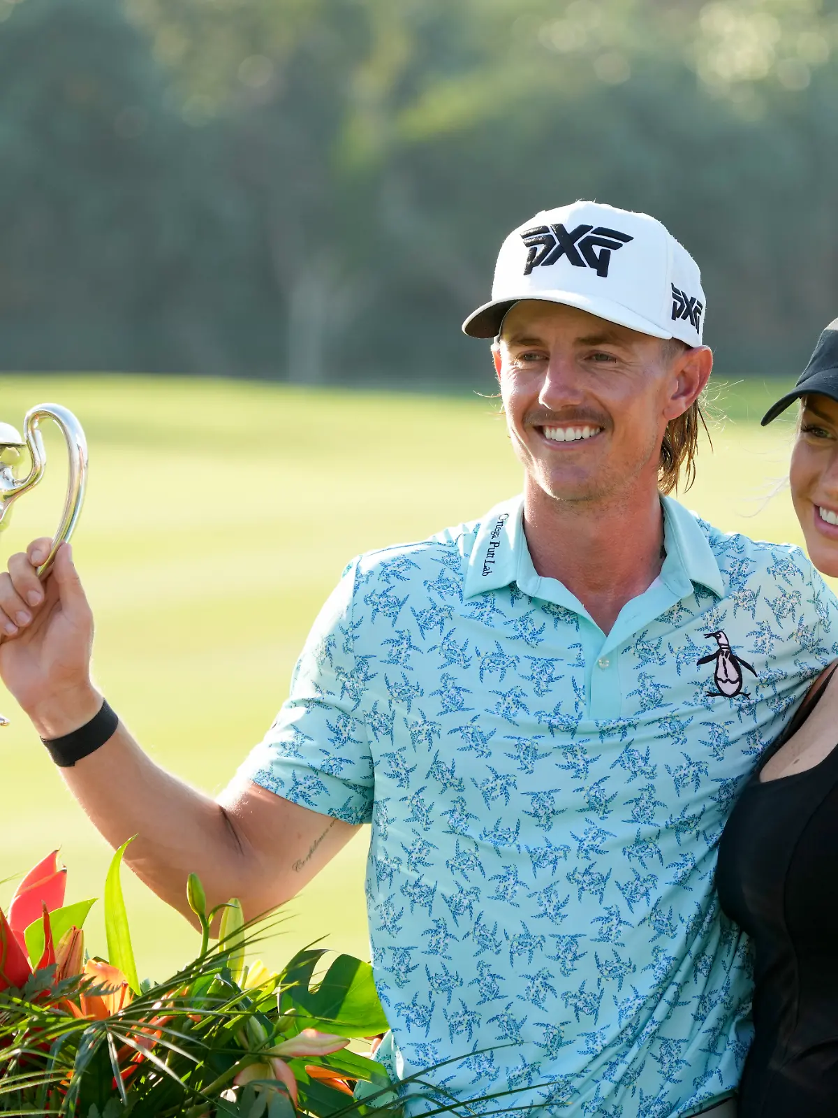 Jake Knapp und Freundin Makena White nach seinem Sieg bei den Mexico Open im Februar 2024