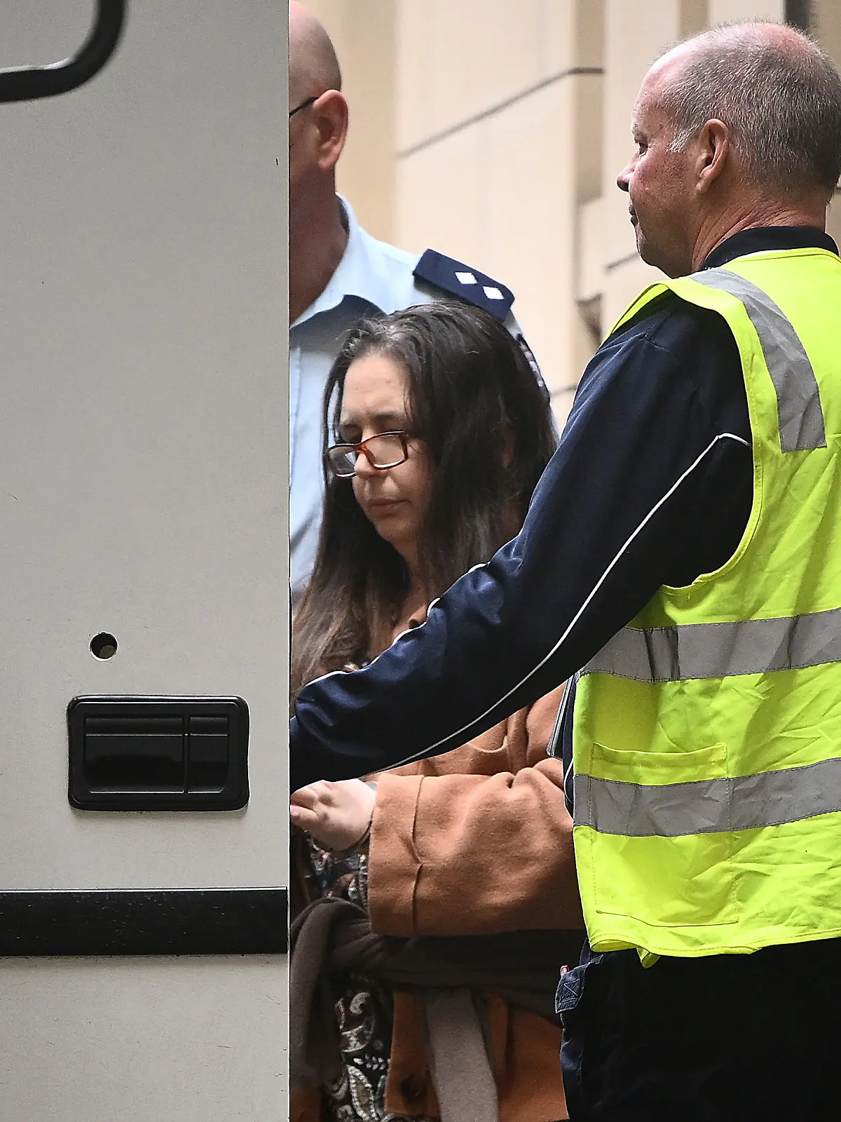 Erin Patterson leaves the Supreme Court of Victoria after being sentenced to 33 years in prison for murdering three relatives and attempting to murder a fourth, in Melbourne