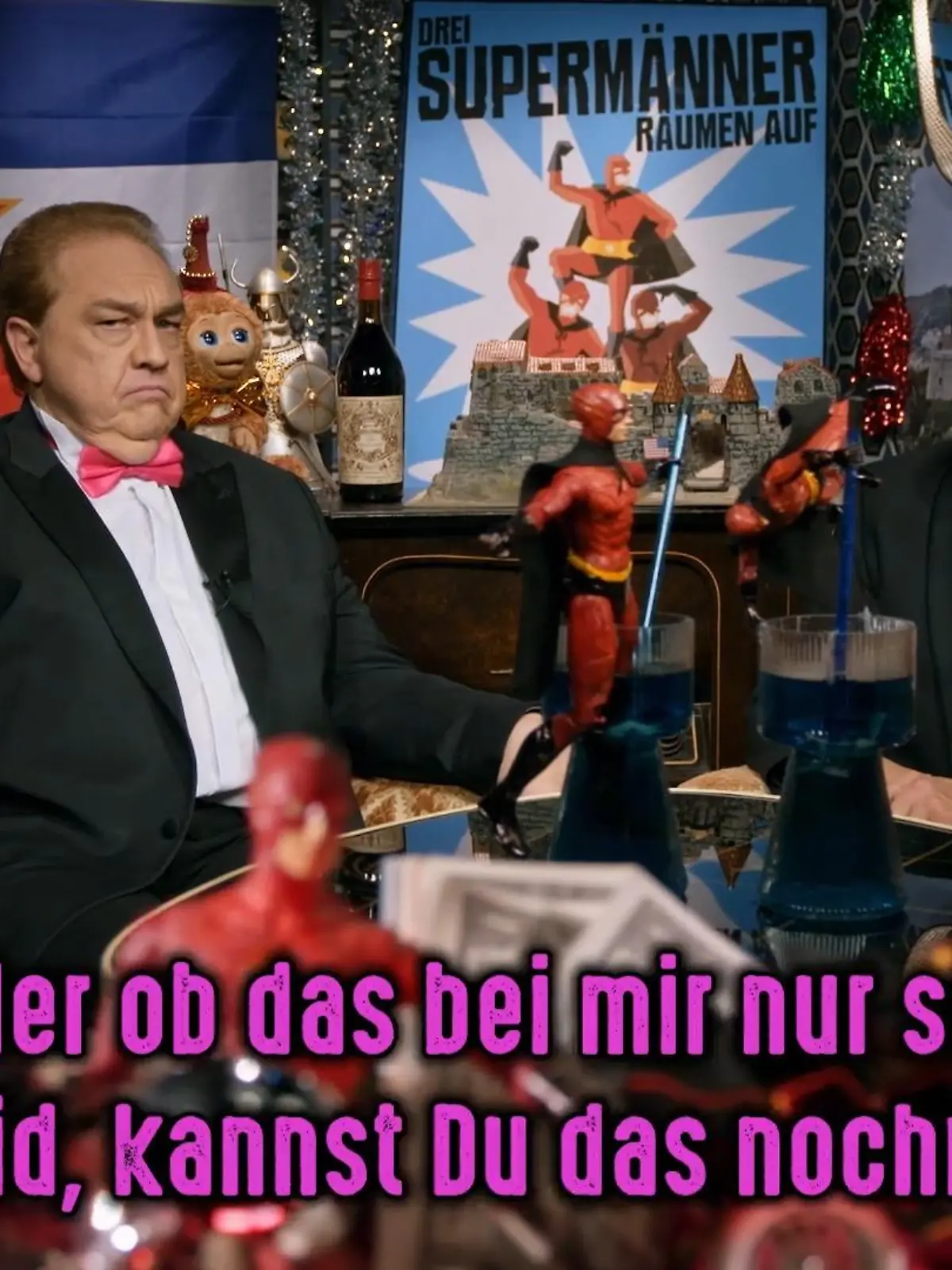 Bild zu: "Drei Supermänner räumen auf"