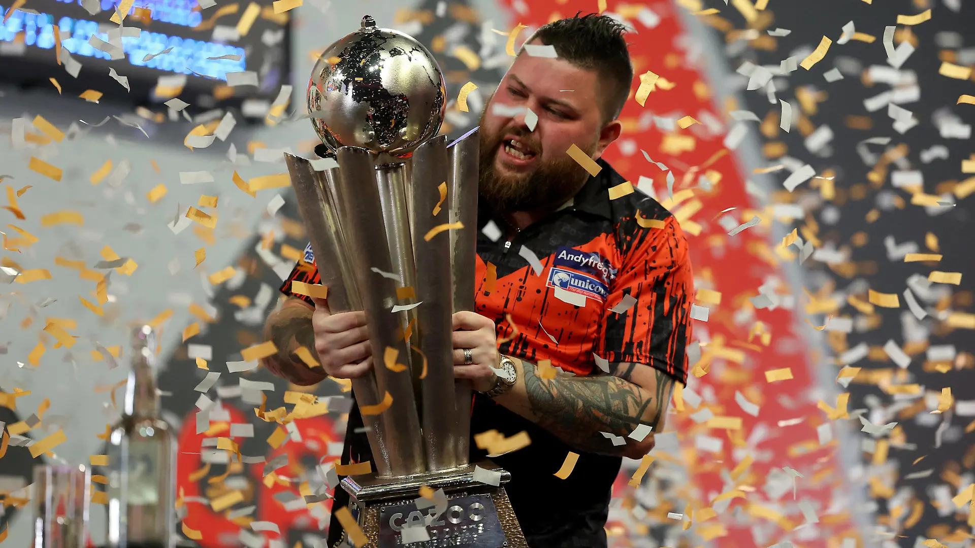 3rd January 2023, Alexandra Palace, London, England 2022/23 PDC Cazoo World Darts Championships Day 16 Final Michael Smith celebrates with the World Darts Championship trophy after beating Van Gerwen by a score of 7-4 PUBLICATIONxNOTxINxUK ActionPlus12464450 ShaunxBrooks