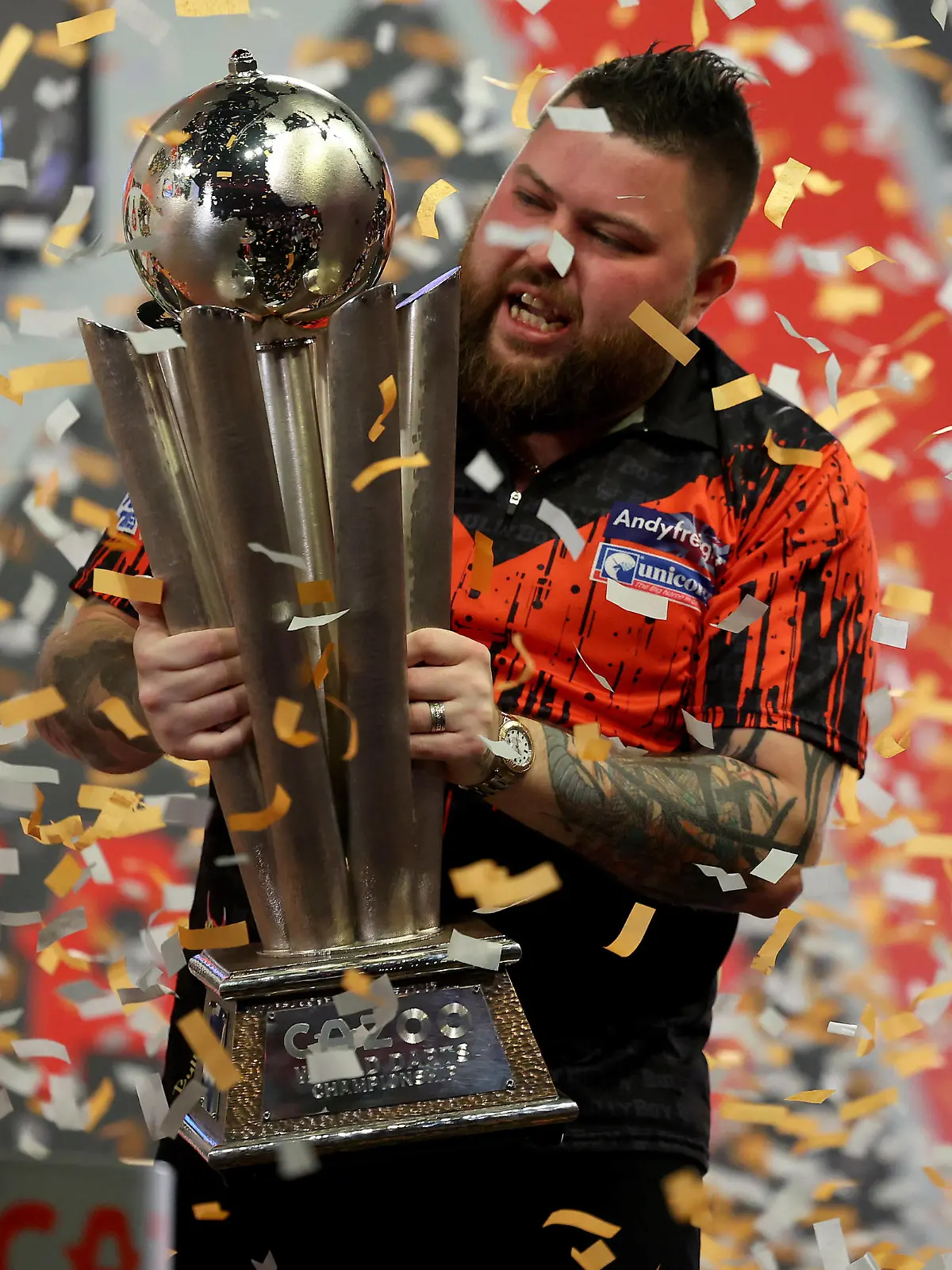 3rd January 2023, Alexandra Palace, London, England 2022/23 PDC Cazoo World Darts Championships Day 16 Final Michael Smith celebrates with the World Darts Championship trophy after beating Van Gerwen by a score of 7-4 PUBLICATIONxNOTxINxUK ActionPlus12464450 ShaunxBrooks