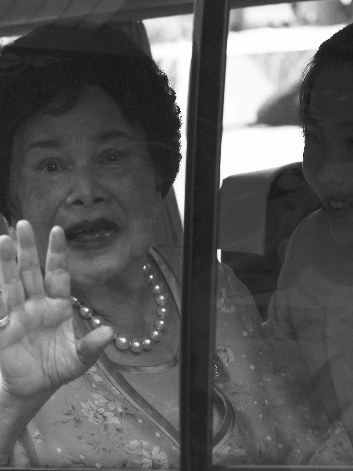 FILE PHOTO: Thailand's Queen Sirikit sits in a vehicle as she leaves Siriraj Hospital in Bangkok