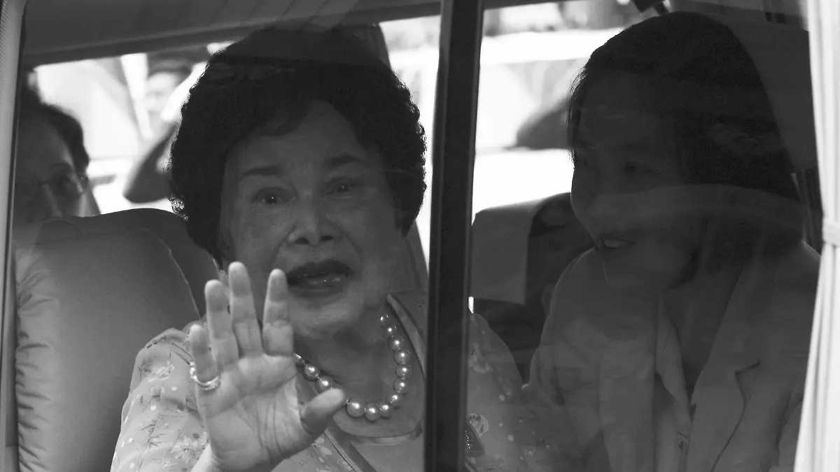FILE PHOTO: Thailand's Queen Sirikit sits in a vehicle as she leaves Siriraj Hospital in Bangkok
