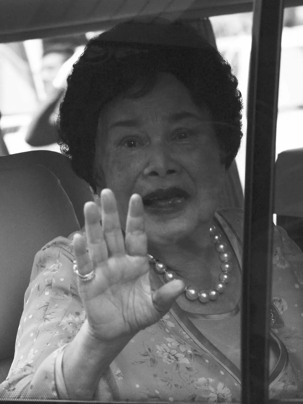 FILE PHOTO: Thailand's Queen Sirikit sits in a vehicle as she leaves Siriraj Hospital in Bangkok