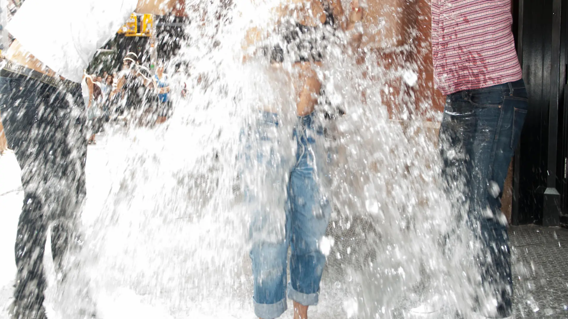 Rita Ora completes the ALS ICE Bucket challenge out side her NYC Hotel and challenges Iggy Azalea to do the challenge next.