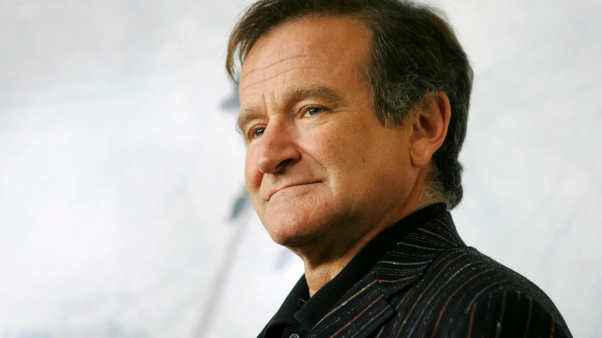 U.S. actor Robin Williams poses for photographers during a photocall in Rome in this file picture taken November 15, 2005. Oscar-winning actor and comedian Williams was found dead on Monday from an apparent suicide at his home in Northern California, Marin County Sheriff's Office said. He was 63. REUTERS/Alessia Pierdomenico/Files (ITALY - Tags: ENTERTAINMENT OBITUARY)