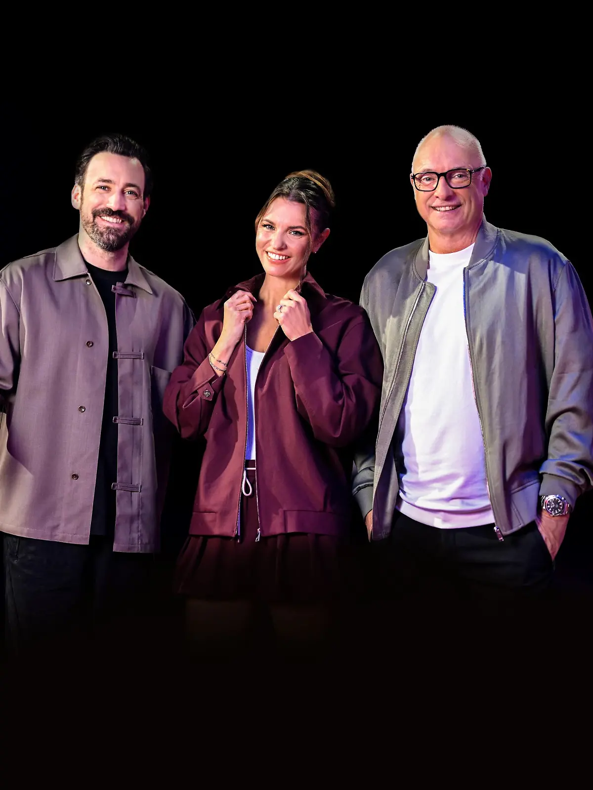 Jan Köppen (l.), Laura Wontorra, Frank „Buschi” Buschmann