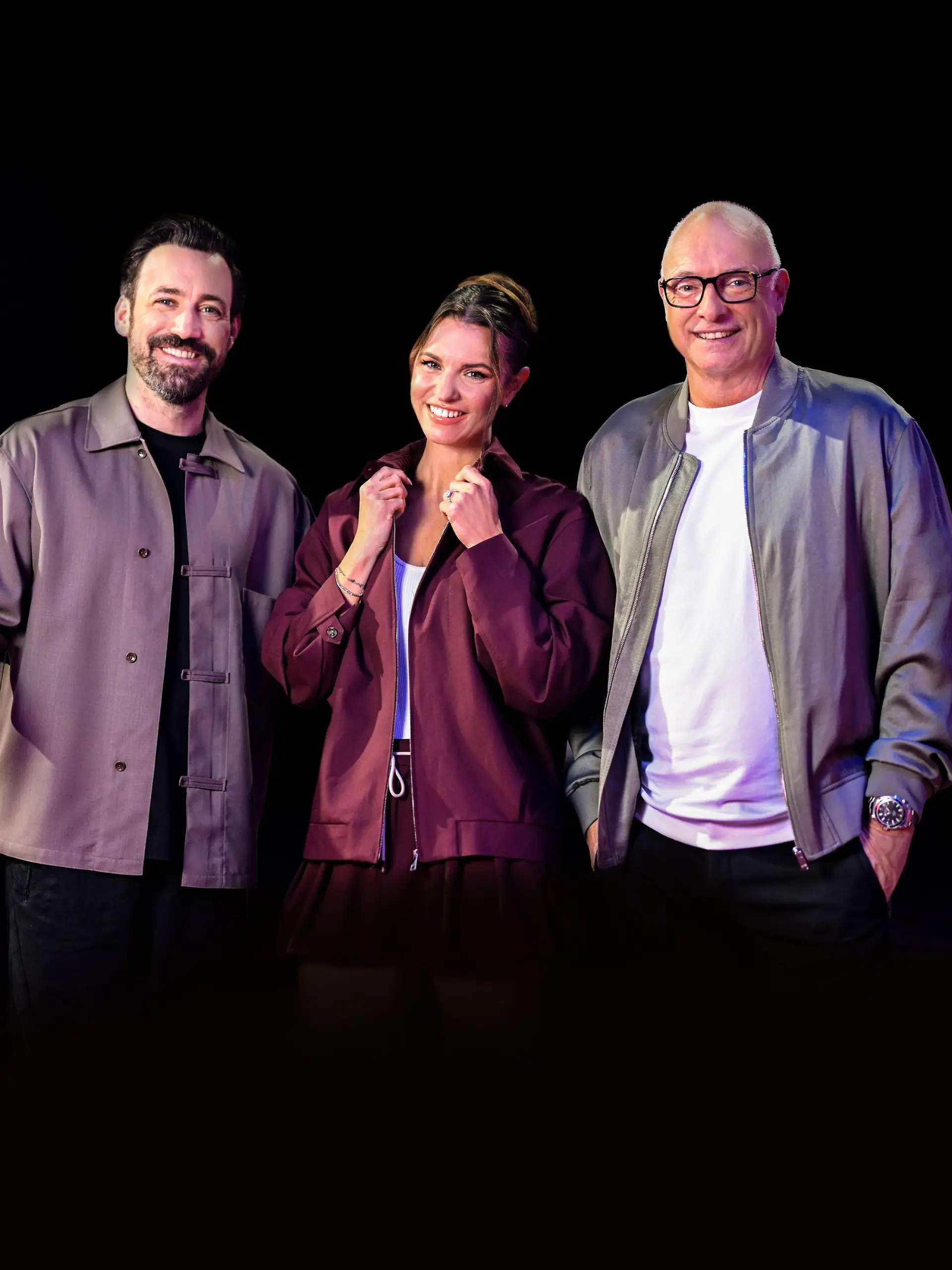 Jan Köppen (l.), Laura Wontorra, Frank „Buschi” Buschmann