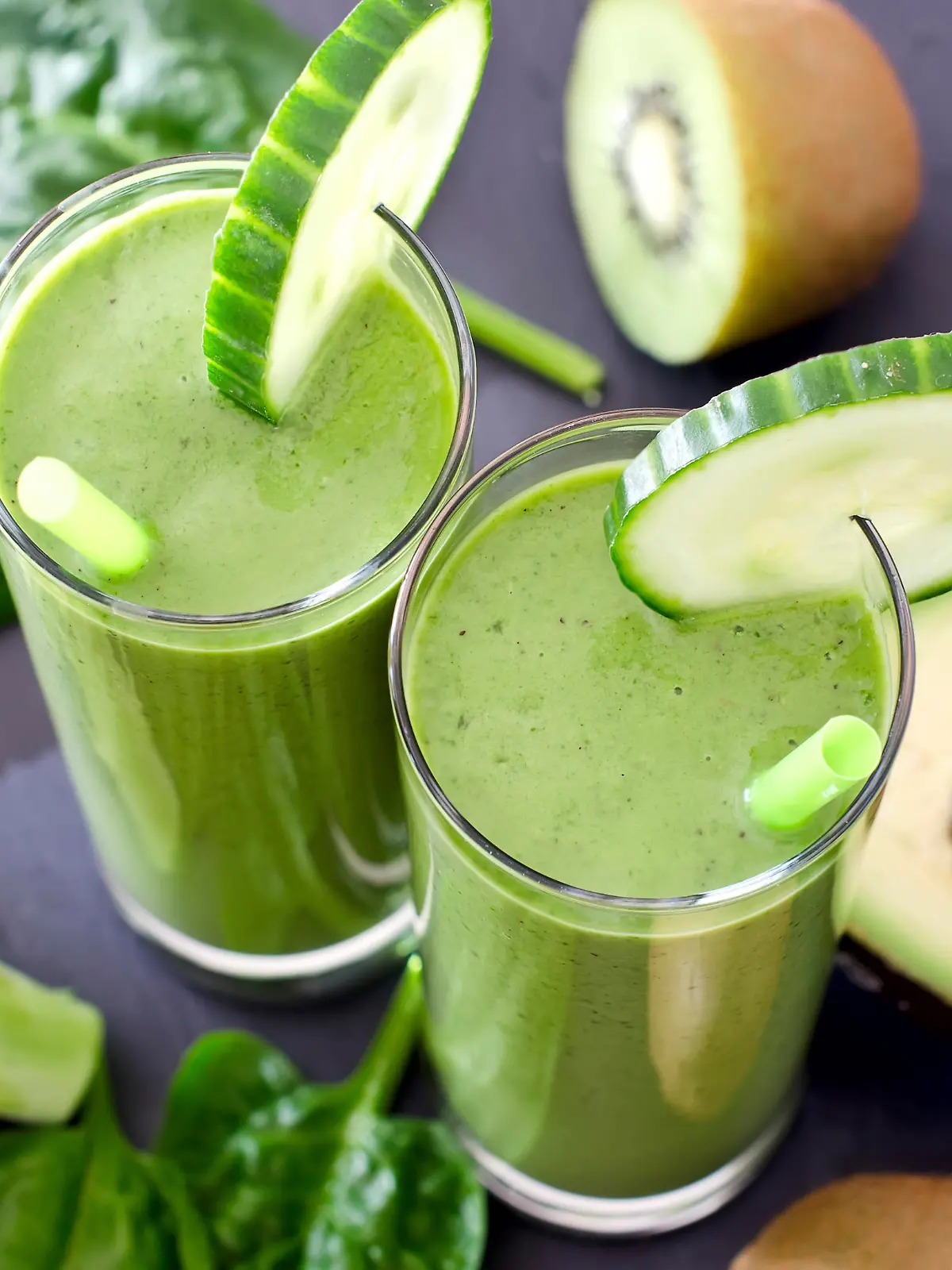 Healthy drink with ingredients on wooden background