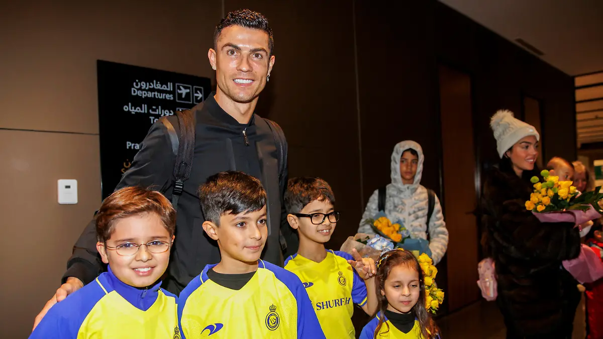 In this photo provided by Al Nassr Club, Cristiano Ronaldo arrives at Riyadh International Airport, late Monday, Jan. 2, 2023. Ronaldo completed a lucrative move to Saudi Arabian club Al Nassr on Friday in a deal that is a landmark moment for Middle Eastern soccer but will see one of Europe's biggest stars disappear from the sport's elite stage. (Courtesy of Al Nassr Club via AP)