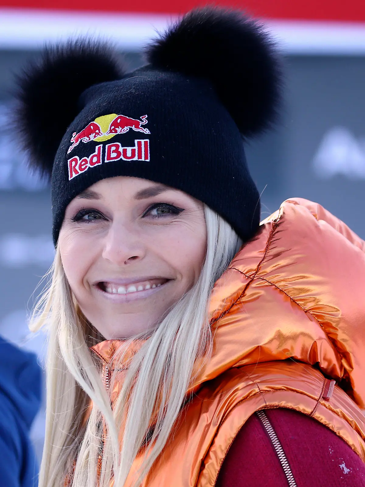 FILE- In this Friday, Jan. 24, 2020, file photo, Former ski star Lindsey Vonn, of United States, smiles in the finish area during the men's World Cup super G alpine ski race in Kitzbuehel, Austria. Vonn, the winningest woman in World Cup history, is scheduled to call the women’s downhill and super-G races in Crans Montana, Switzerland, this weekend for NBC Sports. (AP Photo/Marco Trovati, File)