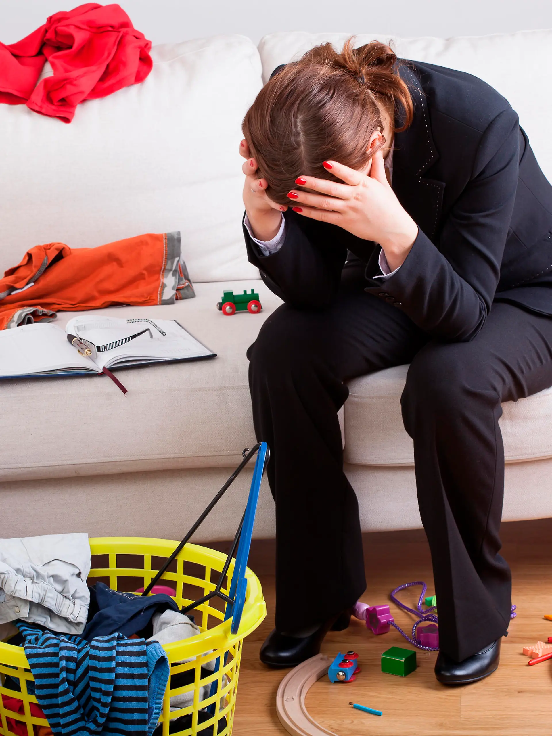 Woman who work and care of house is exhausted and stressed of her workload
