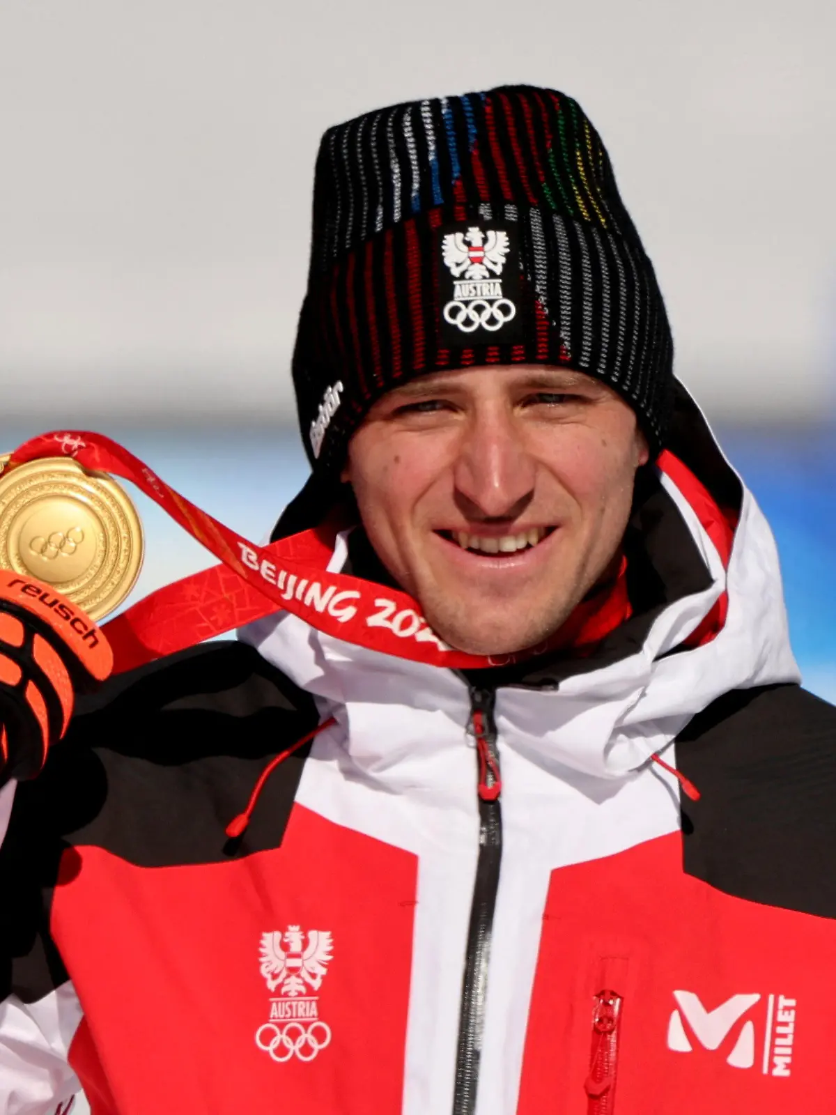 FILE PHOTO: Super-G gold medalist Matthias Mayer of Austria poses with his medal during victory ceremony at 2022 Beijing Olympics - National Alpine Skiing Centre, Yanqing district, Beijing, China - February 8, 2022. REUTERS/Jorge Silva/File Photo