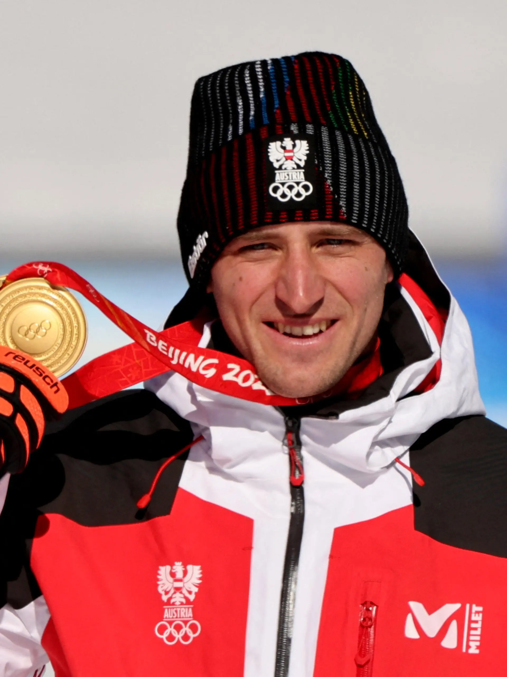 FILE PHOTO: Super-G gold medalist Matthias Mayer of Austria poses with his medal during victory ceremony at 2022 Beijing Olympics - National Alpine Skiing Centre, Yanqing district, Beijing, China - February 8, 2022. REUTERS/Jorge Silva/File Photo