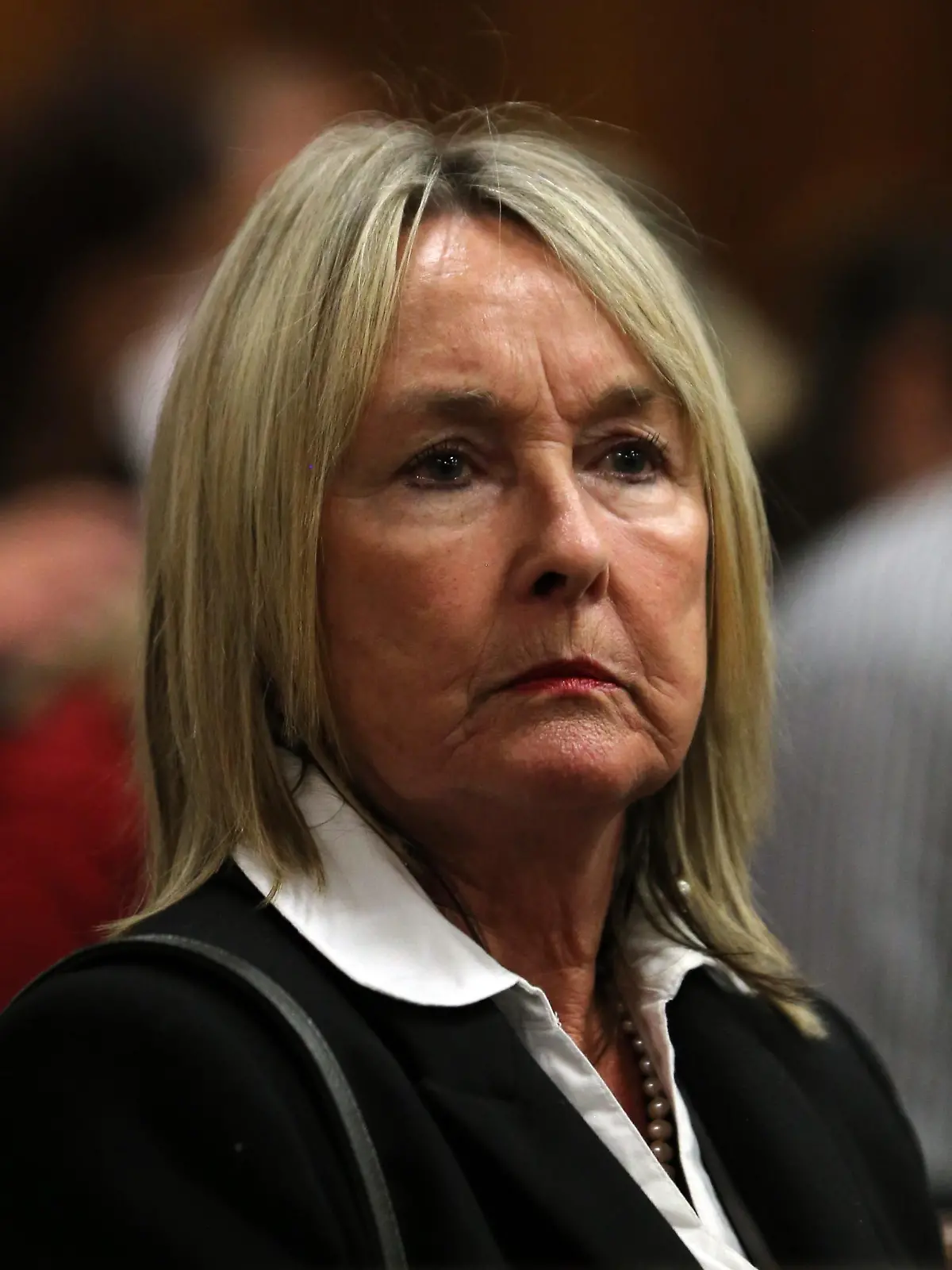 epa04157701 June Steenkamp, mother of Reeva Steenkamp, is seen during the murder trial of South African Paralympic athlete Oscar Pistorius at the North Gauteng High Court, Pretoria, South Africa, 07 April 2014. Pistorius is accused of the murder of his model girlfriend Reeva Steenkamp in February 2013. Pistorius is due to take the stand this week as part of his defense against the charges of murder. EPA/THEMA HADEBE / POOL +++(c) dpa - Bildfunk+++